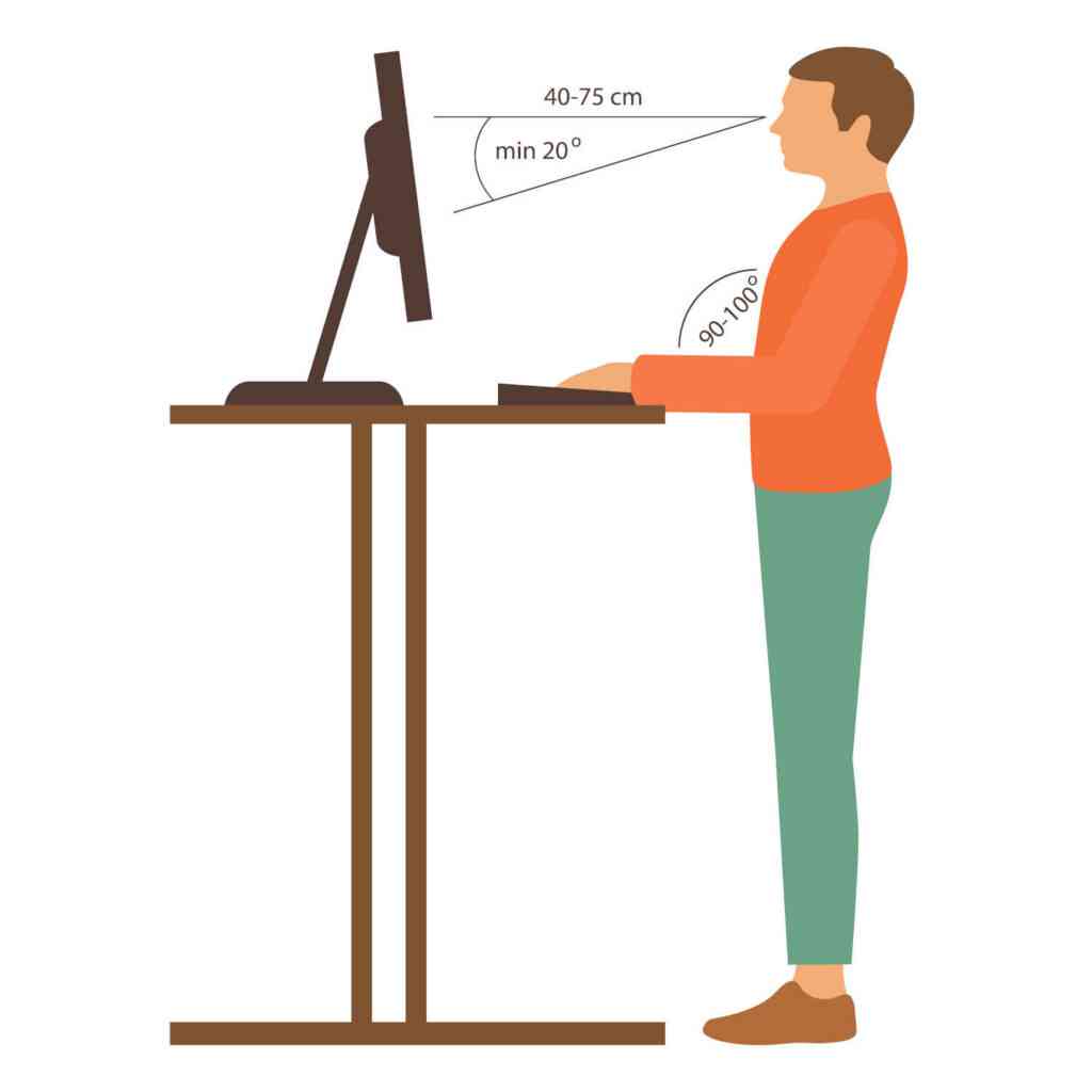 Arbeiten im Stehen an einem Sitz Steh Arbeitsplatz. Wechseln zwischen Stehen und Sitzen am Schreibtisch.